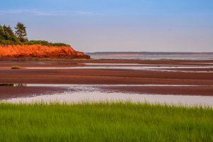 Large spread of sand at a cliffside beach